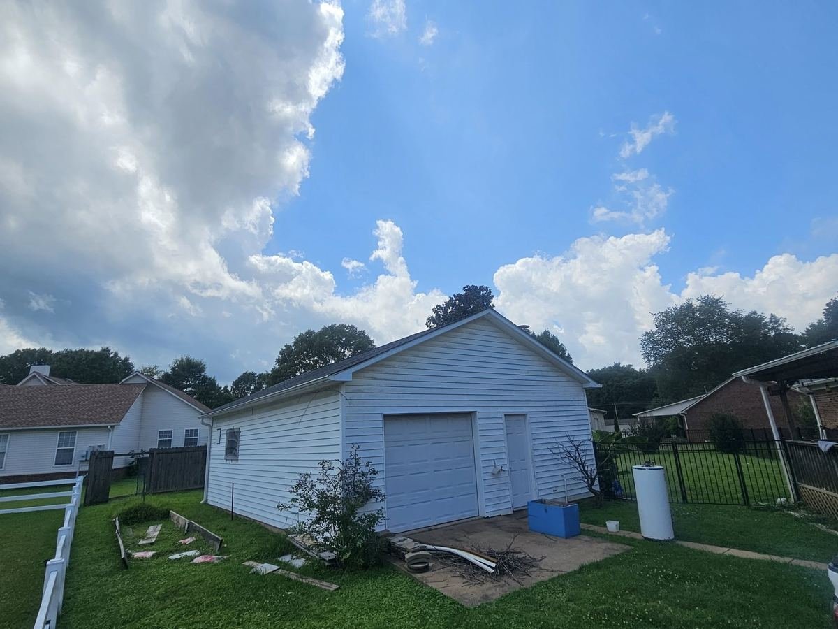 Completed roof replacement on a residential Medina, TN home by Crawford Residential and Industrial Repair.