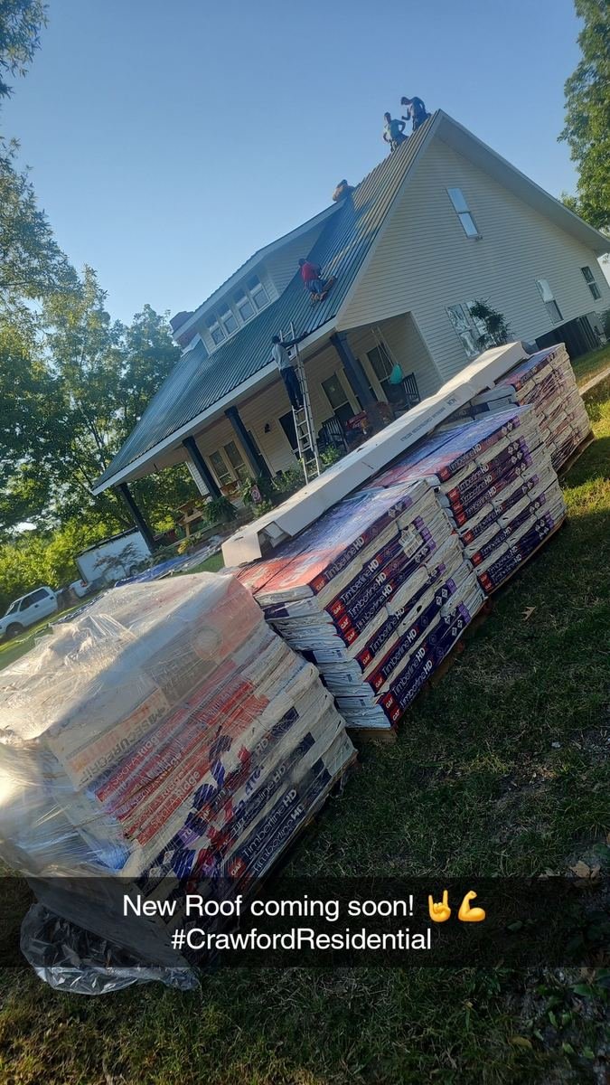 Emergency roofing materials delivered to a Dyersburg, TN home by Crawford Residential.